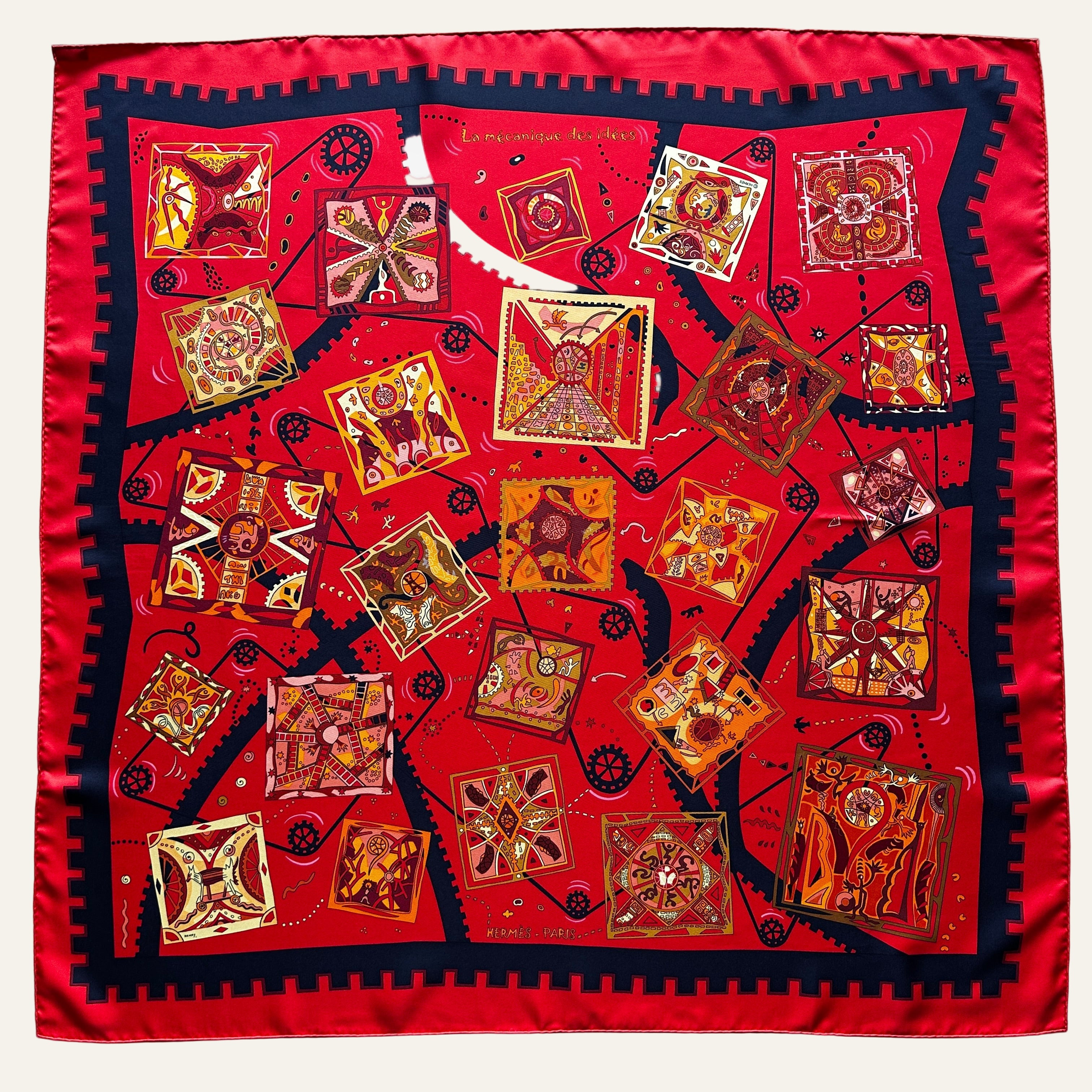 Foulard Hermès La Mécanique des Idées en soie rouge vue d'ensemble, édition 2004.